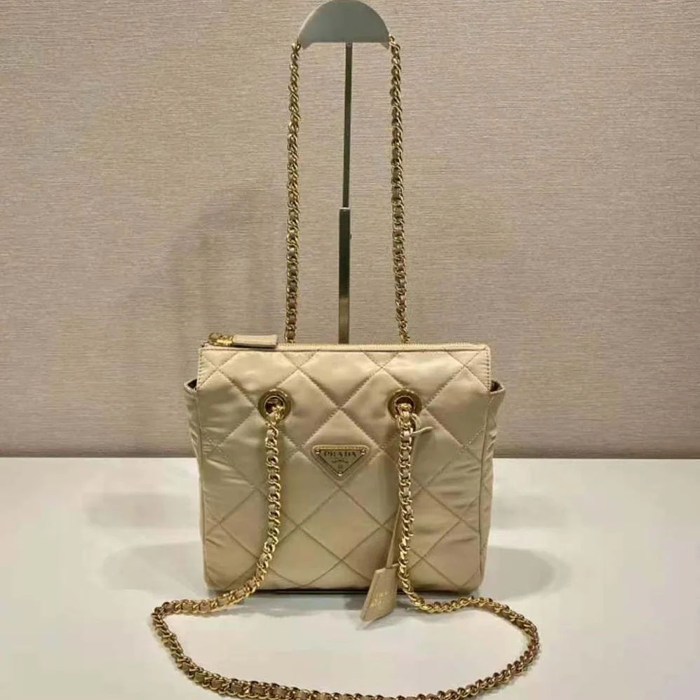 Prada Re-Edition 1995 Chaîne Re-Nylon Tote Bag for Women in Beige Prada Re-Edition 1995 Chaîne Re-Nylon Tote Bag for Women in Beige