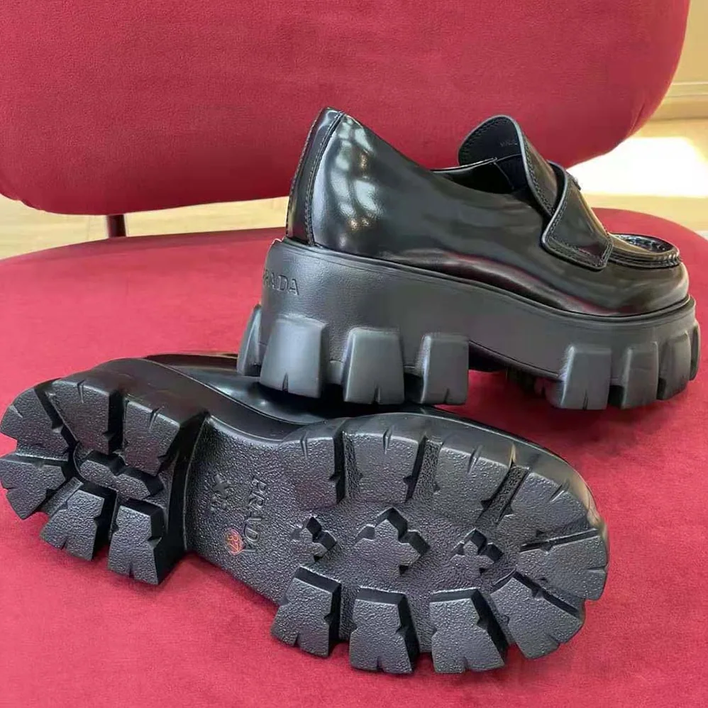 Prada Brushed Leather Monolith Loafers for Unisex in Black