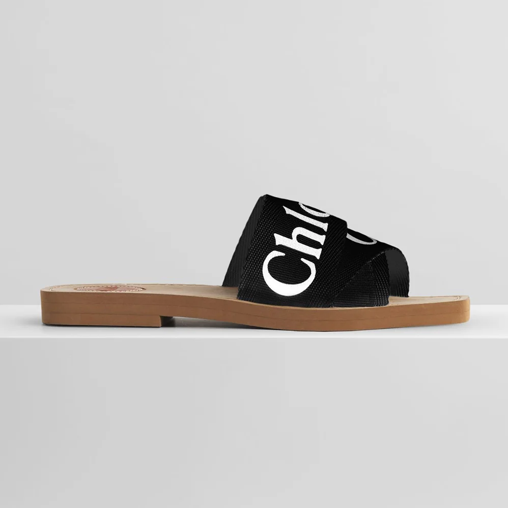 Chloe Woody Flat Mule in Canvas for Women in Black Chloe Woody Flat Mule in Canvas for Women in Black
