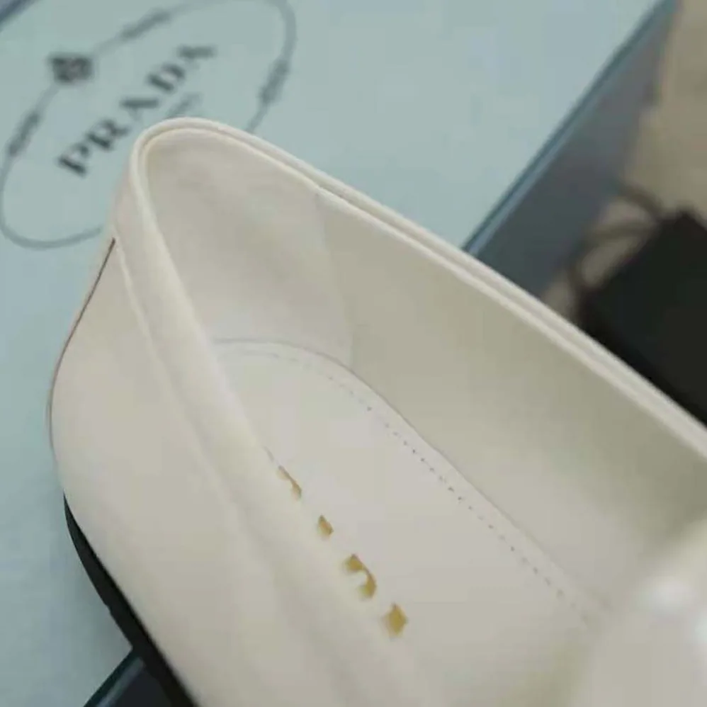 Prada Patent Leather Loafers in 5mm Heel for Women in White Prada Patent Leather Loafers in 5mm Heel for Women in White