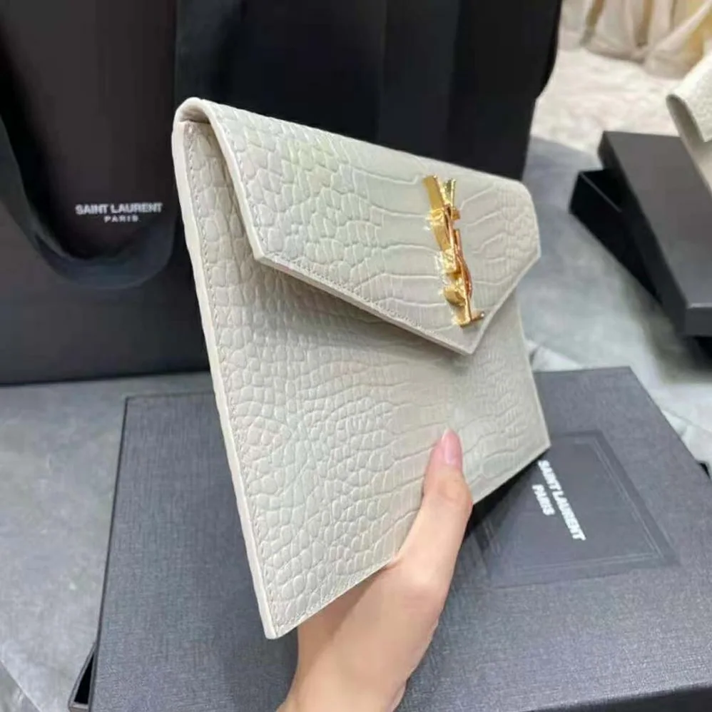Saint Laurent YSL Uptown Pouch in Crocodile Embossed Shiny Leather for Women in Gold Saint Laurent YSL Uptown Pouch in Crocodile Embossed Shiny Leather for Women in Gold