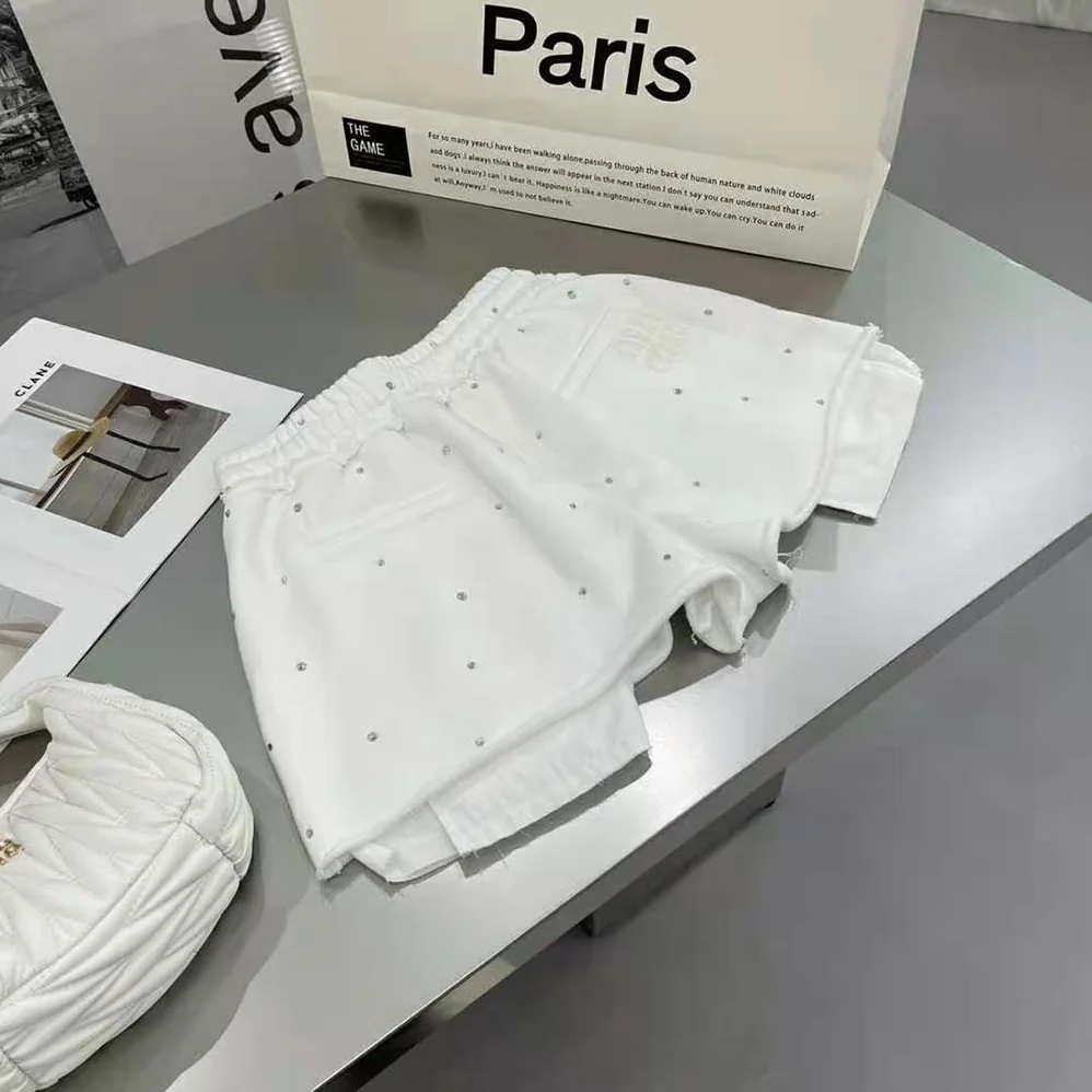 Miu Miu Embroidered Cotton Shorts with Embroidered Logo for Women in White
