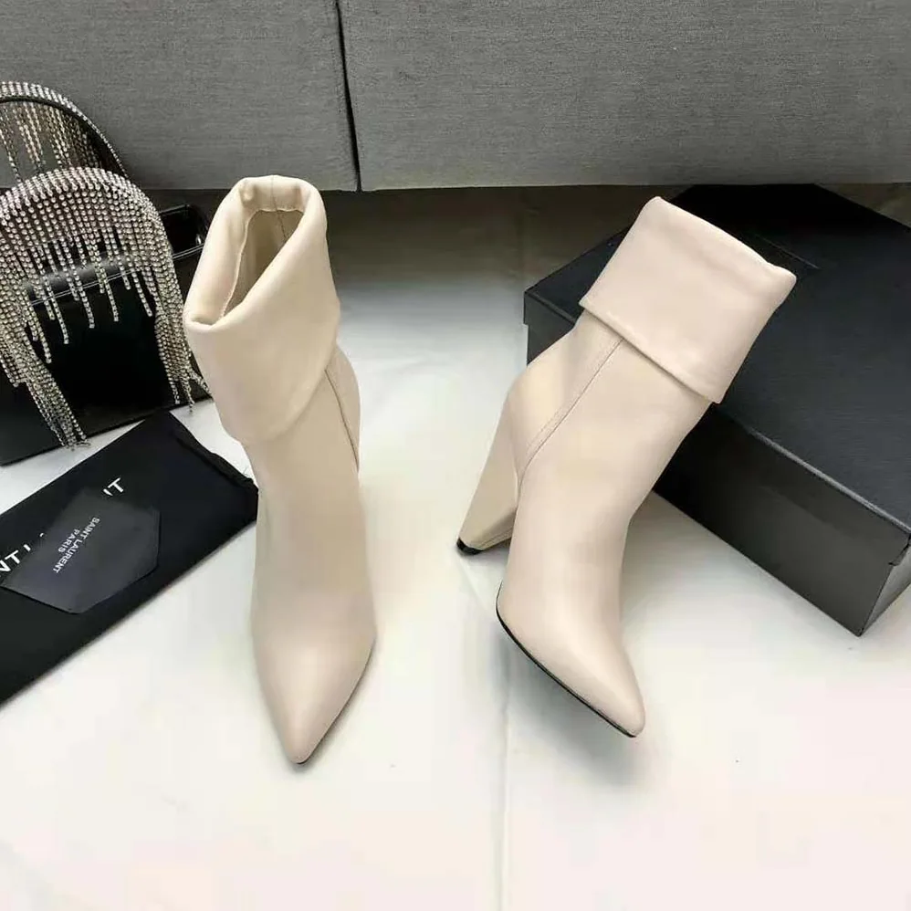 Saint Laurent YSL Niki Booties in Smooth Leather and Silver-Tone Monogram for Women in White Saint Laurent YSL Niki Booties in Smooth Leather and Silver-Tone Monogram for Women in White