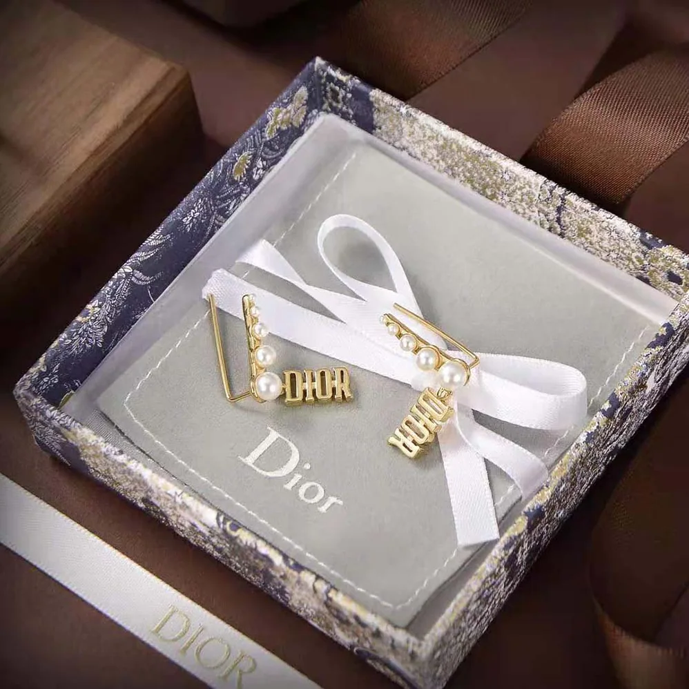 Dior Diorevolution Earrings Gold-Finish Metal and White Resin Pearls for Women Dior Diorevolution Earrings Gold-Finish Metal and White Resin Pearls for Women