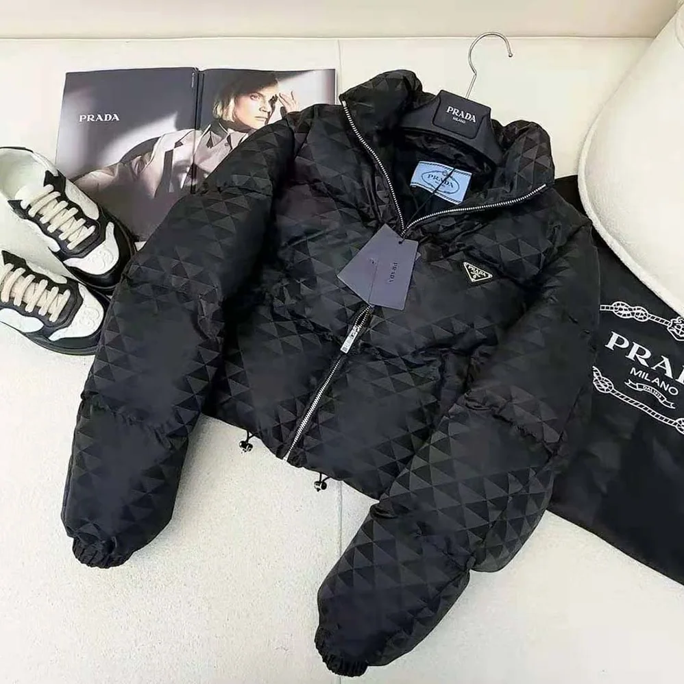 Prada Re-Nylon Cropped Hooded Down Jacket for Women in Black Prada Re-Nylon Cropped Hooded Down Jacket for Women in Black