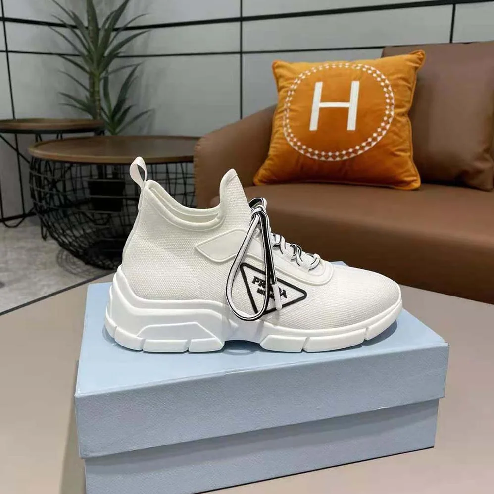 Prada The Triangle Logo Decorates These Knit Fabric Sneakers for Women in White Prada The Triangle Logo Decorates These Knit Fabric Sneakers for Women in White