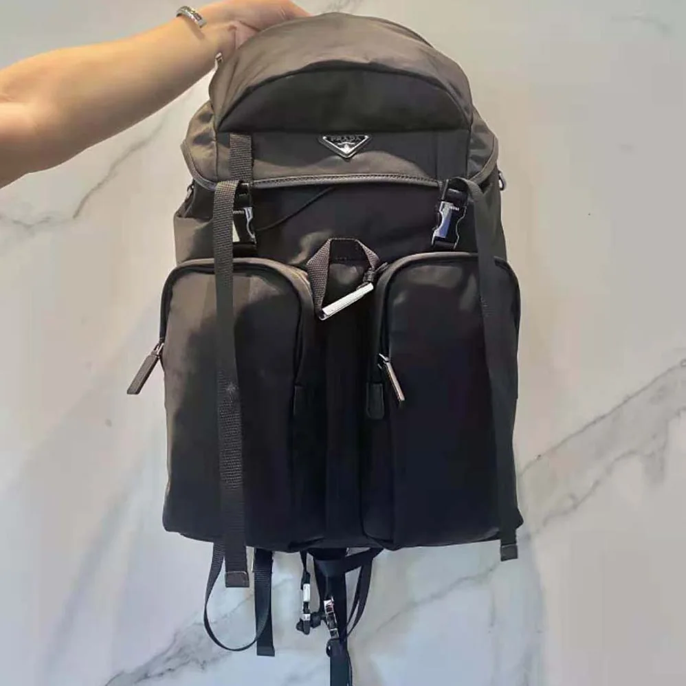 Prada Re-Nylon and Saffiano Leather Backpack with Triangle Logo for Unisex in Black