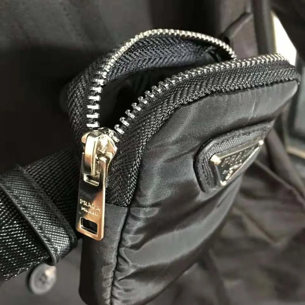 Prada Re-Nylon Gabardine Trench Coat for Women in Black Prada Re-Nylon Gabardine Trench Coat for Women in Black