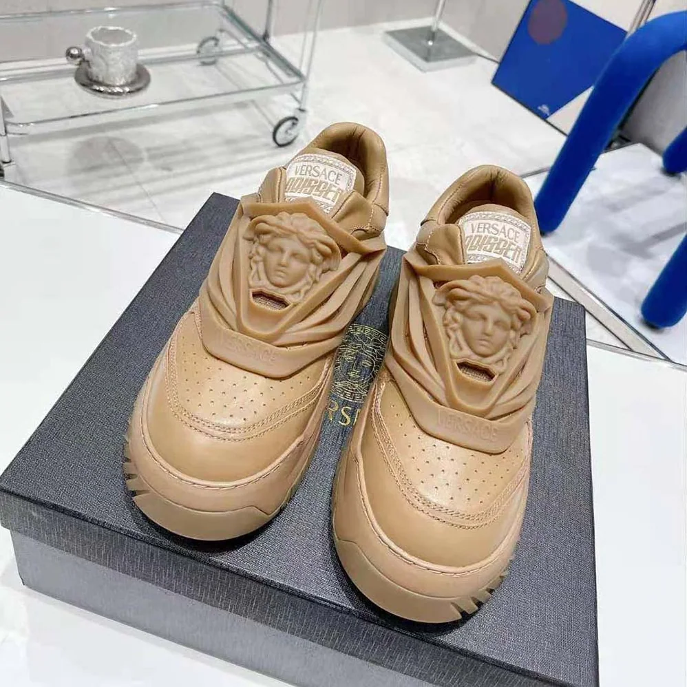 Versace Odissea Sneakers are Set on Rubber Soles with Perforated Toe Caps for Unisex in Brown Versace Odissea Sneakers are Set on Rubber Soles with Perforated Toe Caps for Unisex in Brown