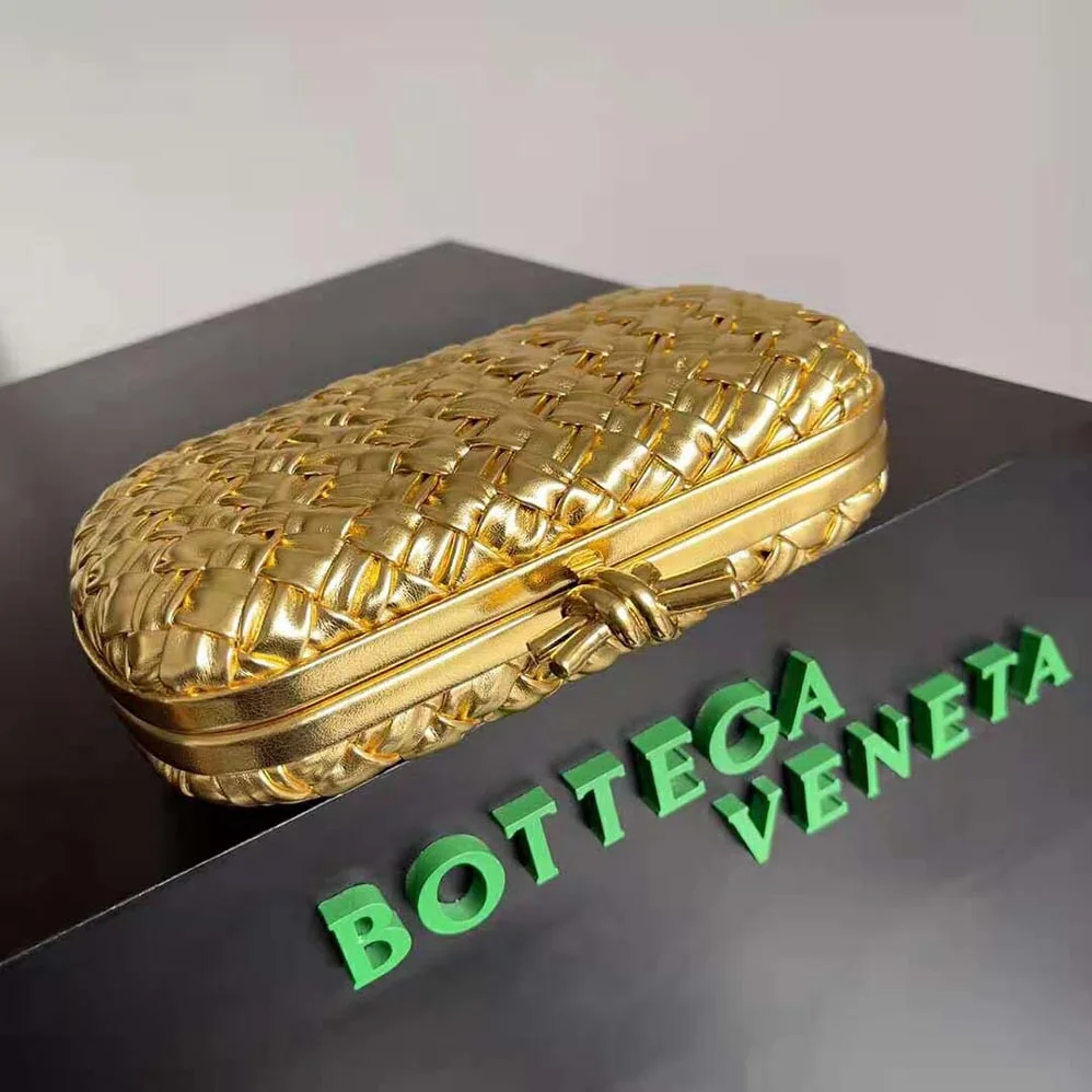 Bottega Veneta Knot Pressed Intreccio Laminated Leather Minaudiere for Women in Gold