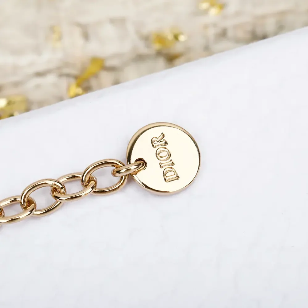 Dior Petit CD Lucky Baroque Earrings Gold for Women in Finish Metal Dior Petit CD Lucky Baroque Earrings Gold for Women in Finish Metal