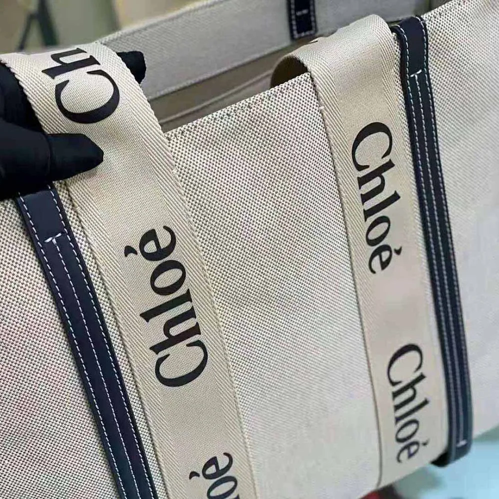 Chloe Large Woody Tote Bag in Cotton Canvas and Shiny Calfskin with Woody Ribbo for Women Chloe Large Woody Tote Bag in Cotton Canvas and Shiny Calfskin with Woody Ribbo for Women