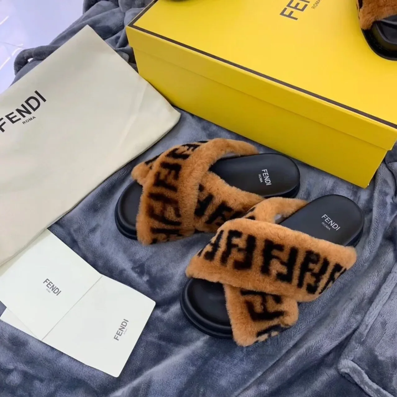 Fendi Shearling FF Logo Leather & Dyed Shearling Fur Cross Slides Fall/Winter 2019 Collection, Black in Brown Fendi Shearling FF Logo Leather & Dyed Shearling Fur Cross Slides Fall/Winter 2019 Collection, Black in Brown