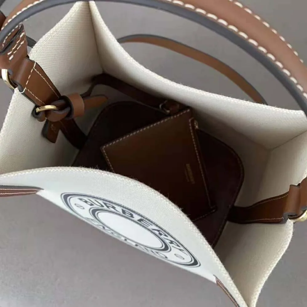 Burberry Small Logo Graphic Cotton Canvas Peggy Bucket Bag for Women Burberry Small Logo Graphic Cotton Canvas Peggy Bucket Bag for Women