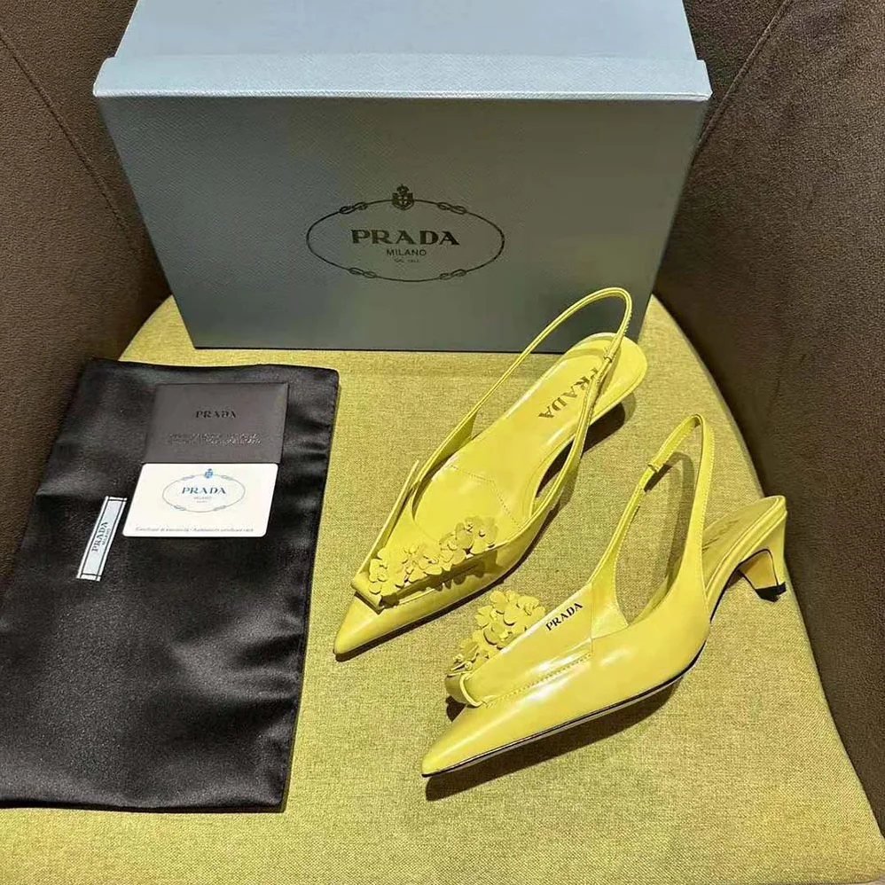 Prada Brushed Leather Slingback Pumps with Floral Appliques for Women in Yellow