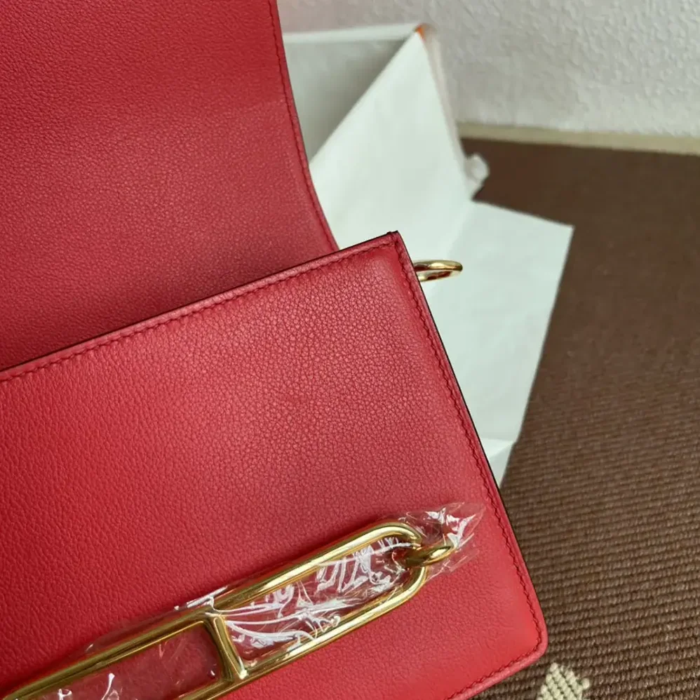 Hermes Roulis Mini Bag in Evercolor Calfskin for Women in Red/Gold