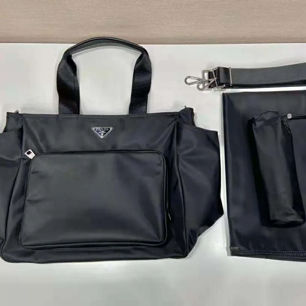 Prada Re-Nylon Baby Bag with Triangle Logo for Unisex in Black Prada Re-Nylon Baby Bag with Triangle Logo for Unisex in Black