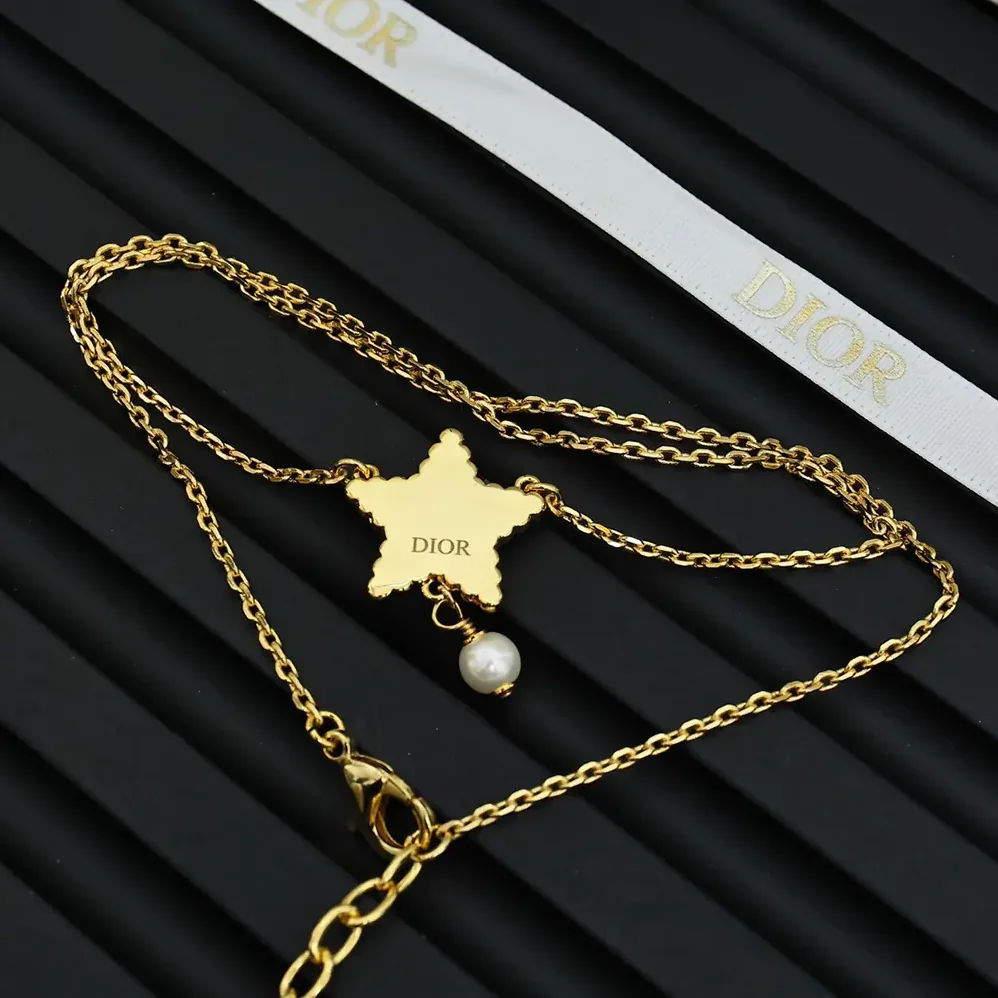 Dior Petit CD Lucky Baroque Necklace Gold-Finish Metal with White Resin Pearls and Deep Ocean Blue Glass for Women Dior Petit CD Lucky Baroque Necklace Gold-Finish Metal with White Resin Pearls and Deep Ocean Blue Glass for Women