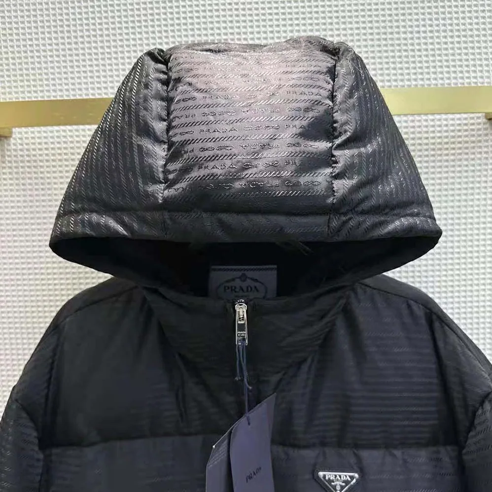 Prada Re-Nylon Hooded Down Jacket for Women in Black Prada Re-Nylon Hooded Down Jacket for Women in Black