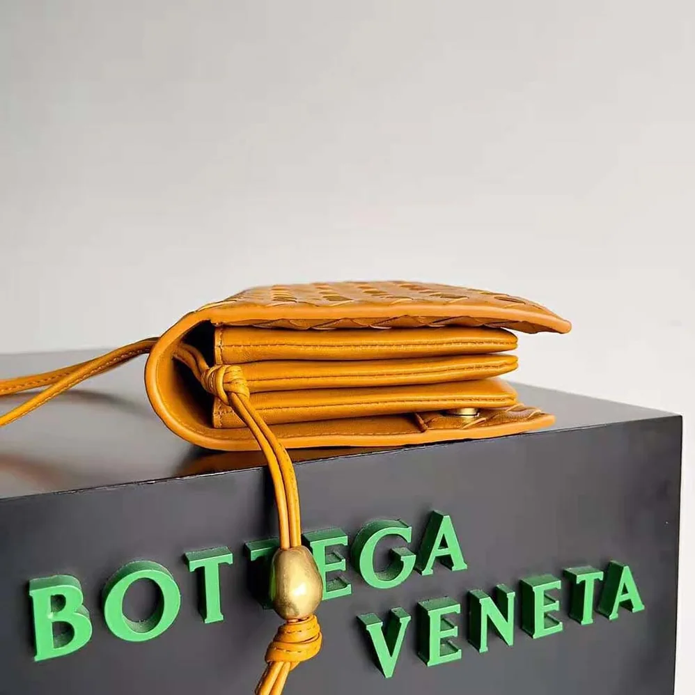 Bottega Veneta Trio Pouch On Strap Mini Intrecciato Leather Shoulder Bag for Women in Orange Bottega Veneta Trio Pouch On Strap Mini Intrecciato Leather Shoulder Bag for Women in Orange