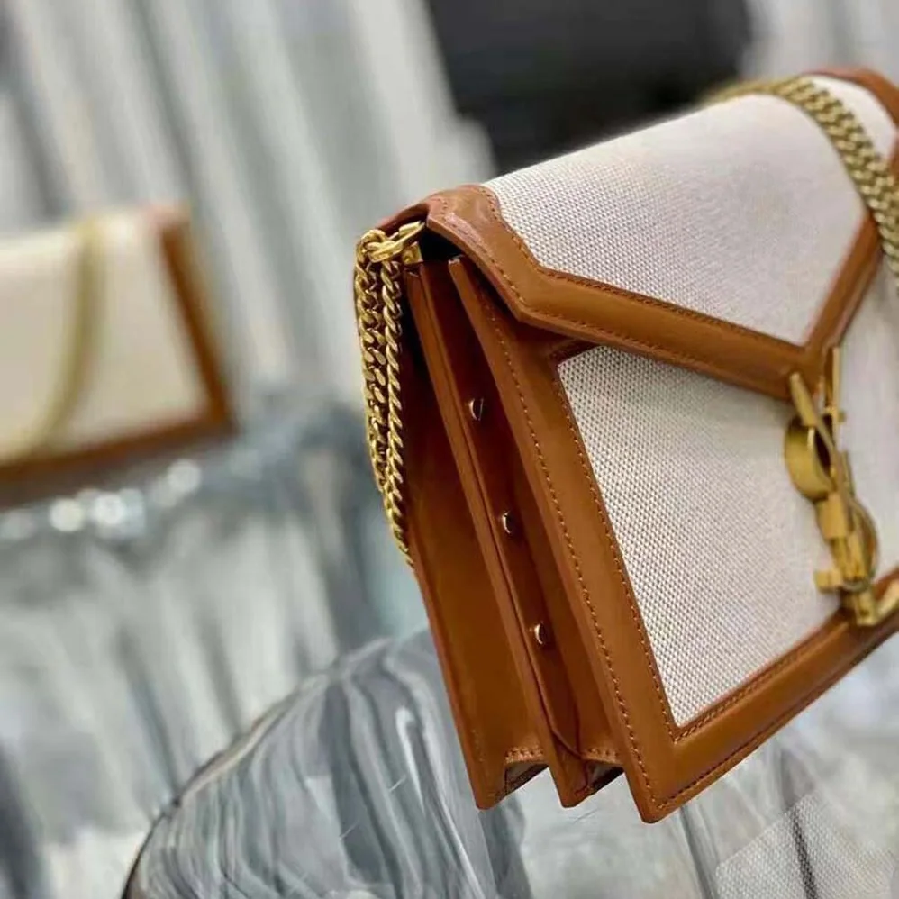 Saint Laurent YSL Cassandra Monogram Clasp Bag in Canvas and Smooth Leather for Women