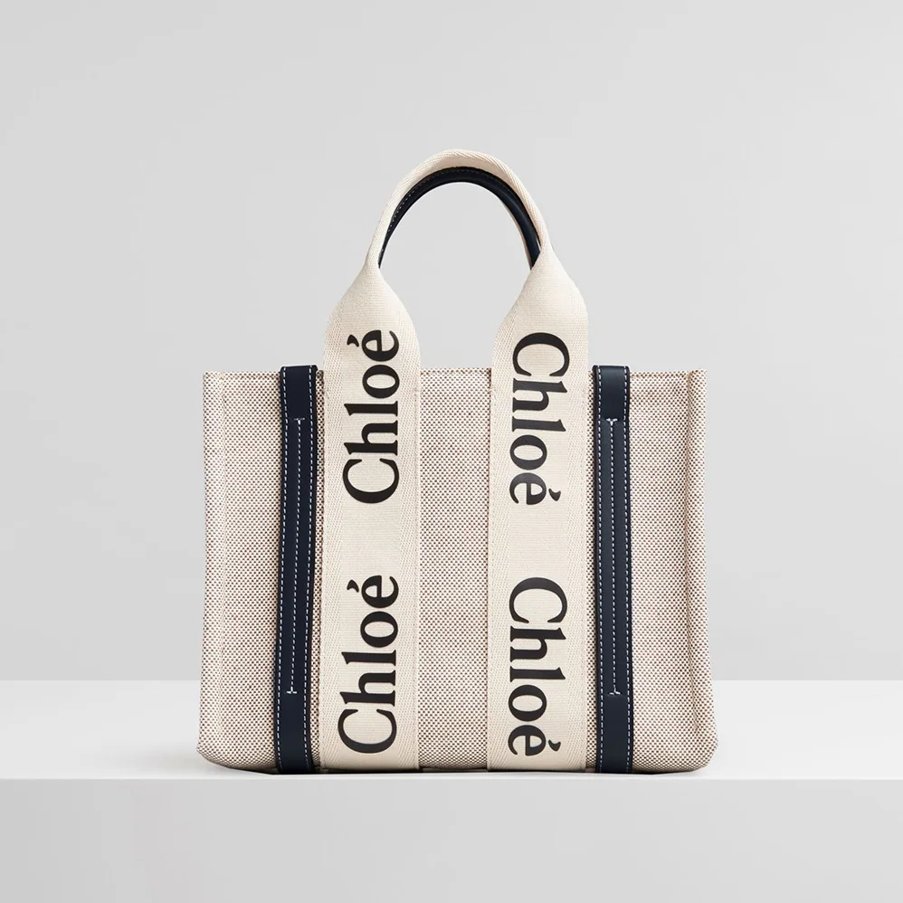 Chloe Small Woody Tote Bag in Cotton Canvas and Shiny Calfskin with Woody Ribbo for Women in Black Chloe Small Woody Tote Bag in Cotton Canvas and Shiny Calfskin with Woody Ribbo for Women in Black