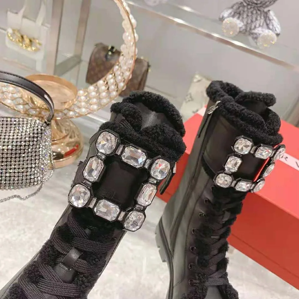 Roger Vivier Walky Viv' Shearling Strass Buckle Boots in Leather for Women in Black Roger Vivier Walky Viv' Shearling Strass Buckle Boots in Leather for Women in Black