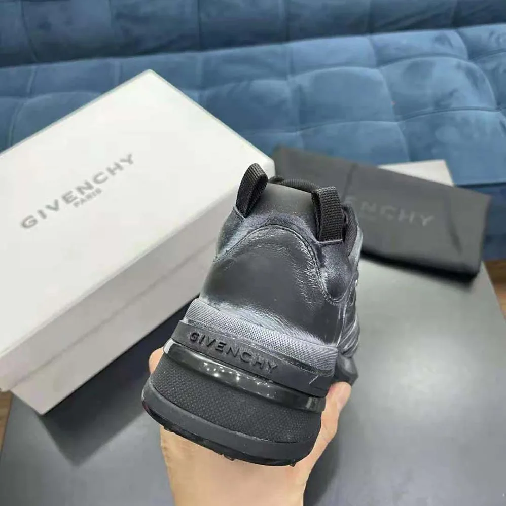 Givenchy Giv 1 Sneakers in Leather with Tag Effect Prints for Men in Black