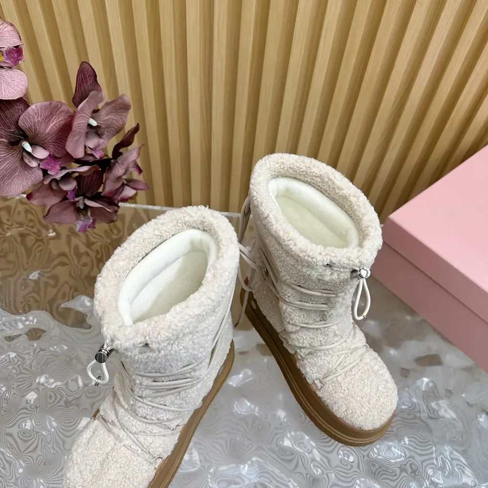 Miu Miu Shearling Après-ski Boots for Women in White