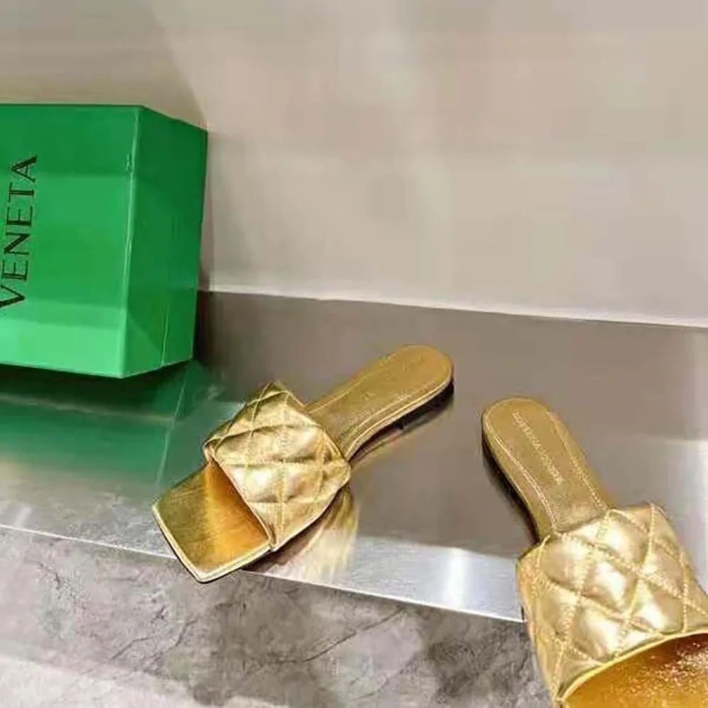 Bottega Veneta Lido Flat Sandal Intreccio Metallised Leather Flat Sandals for Women in Gold