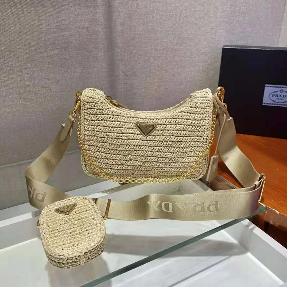 Prada Re-Edition 2005 Raffia Bag for Women in Natural Prada Re-Edition 2005 Raffia Bag for Women in Natural