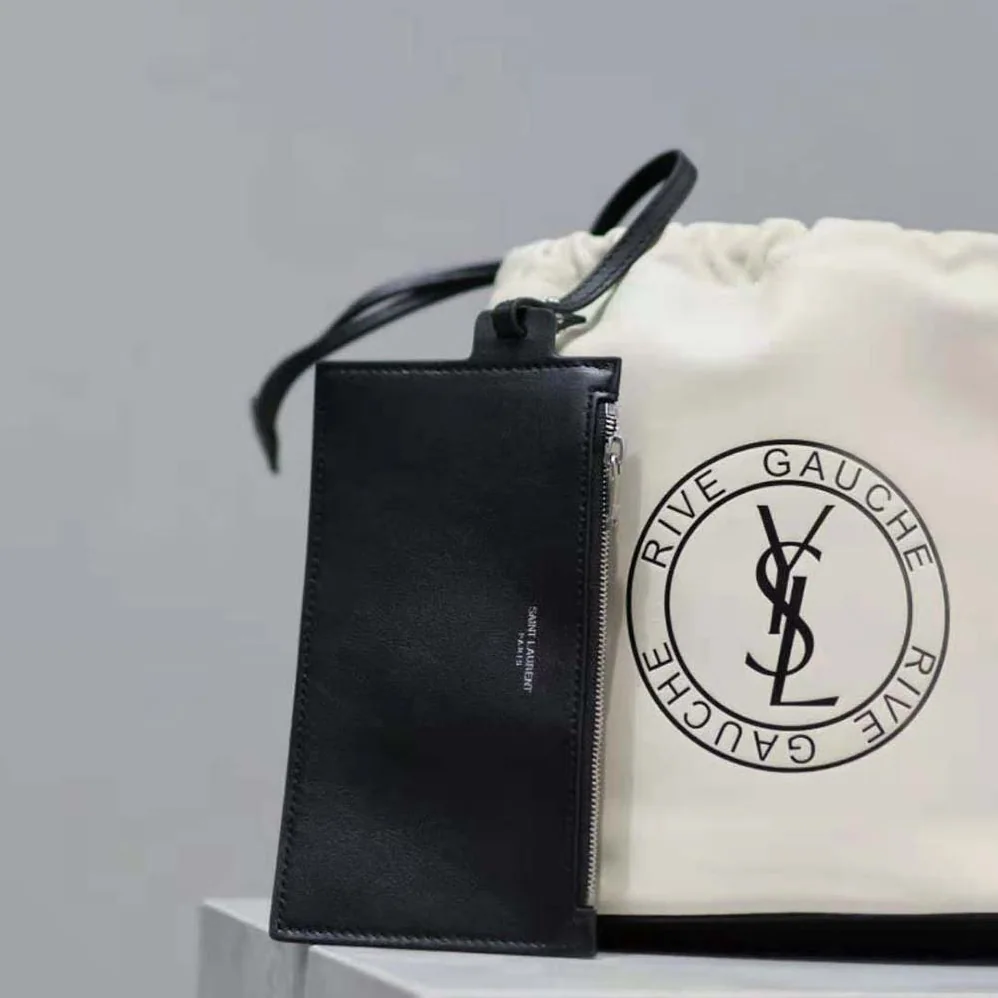Saint Laurent YSL Rive Gauche Laced Bucket Bag in Smooth Leather for Men in Beige