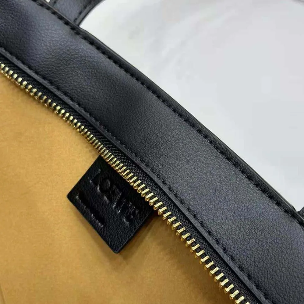 Loewe Cropped Puzzle Fold Bag in Shiny Calfskin for Women in Black Loewe Cropped Puzzle Fold Bag in Shiny Calfskin for Women in Black