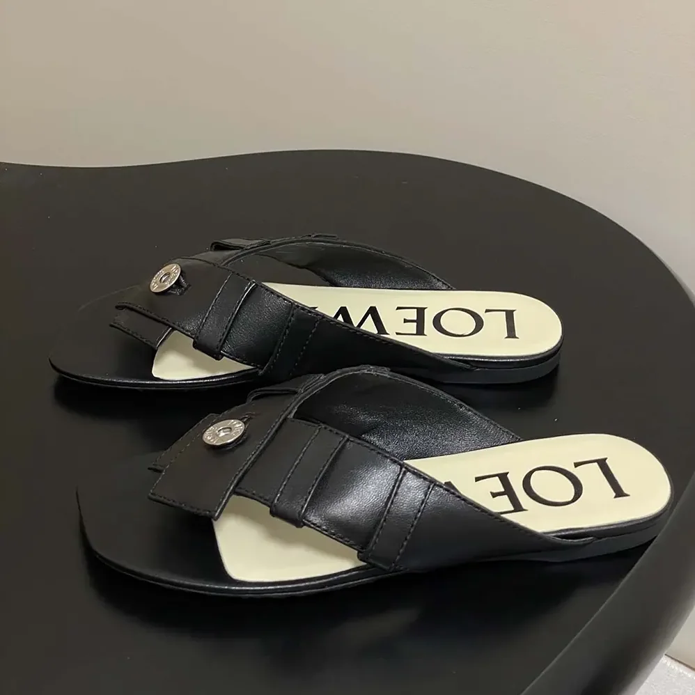 Loewe Toy Panta Toe Post Sandal in Lambskin for Women in Black Loewe Toy Panta Toe Post Sandal in Lambskin for Women in Black