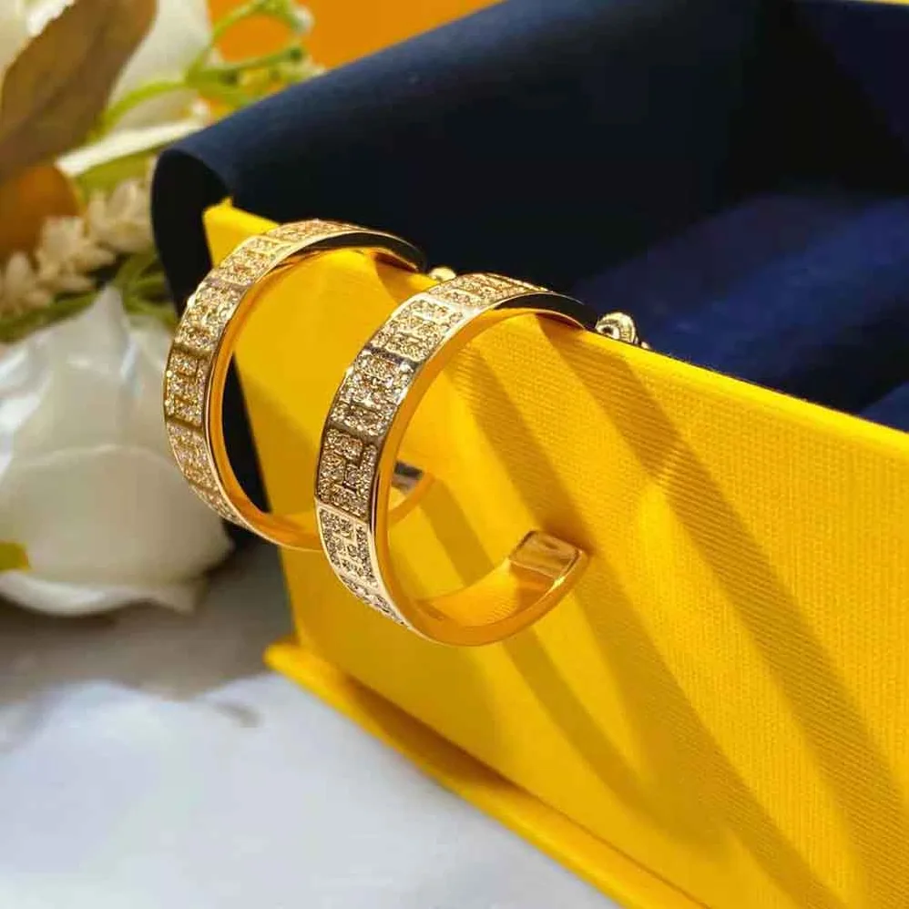 Fendi Hoop Earrings with FF Motif Gold for Women in colored Fendi Hoop Earrings with FF Motif Gold for Women in colored