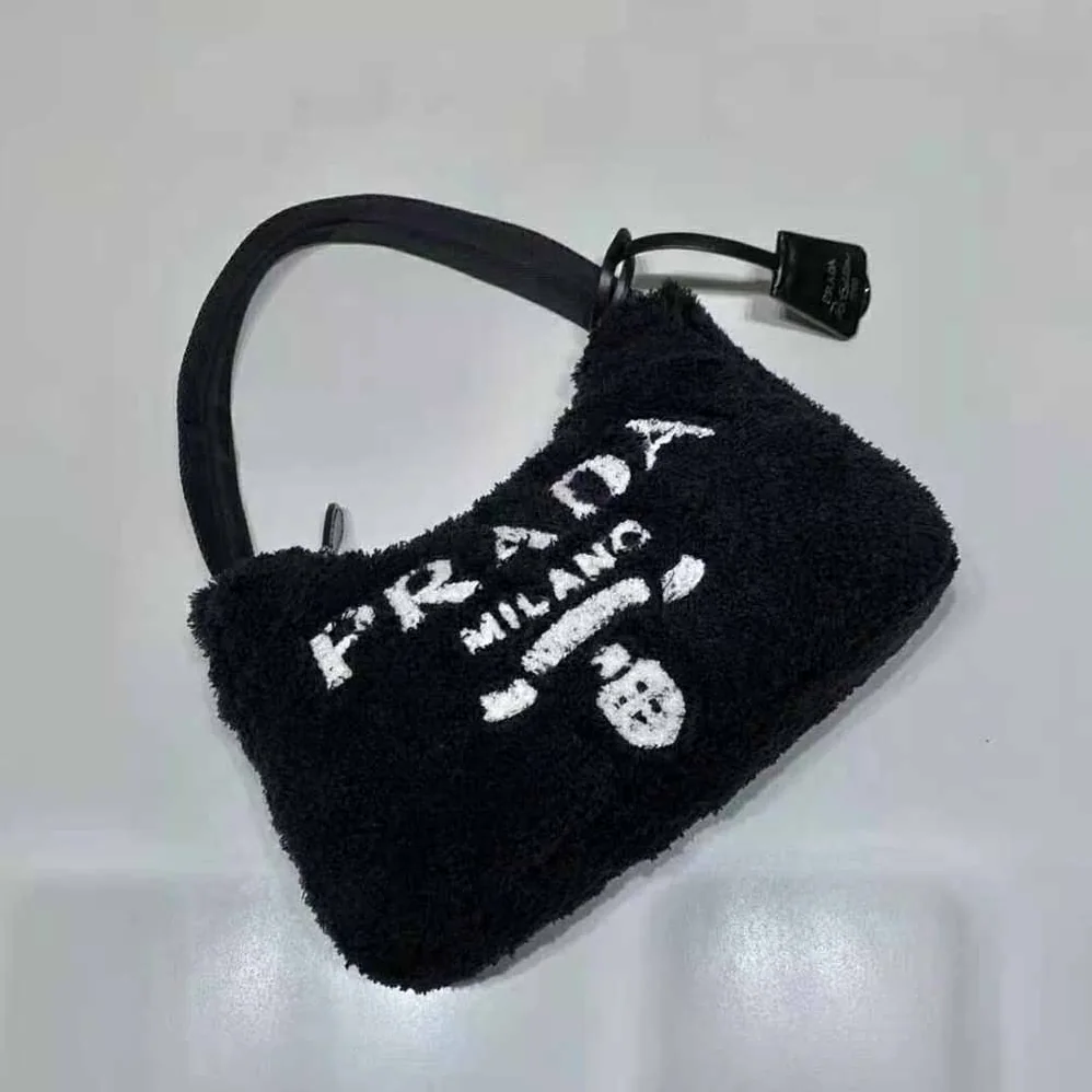 Prada Re-Edition 2000 Terry Mini-Bag for Women in Black Prada Re-Edition 2000 Terry Mini-Bag for Women in Black