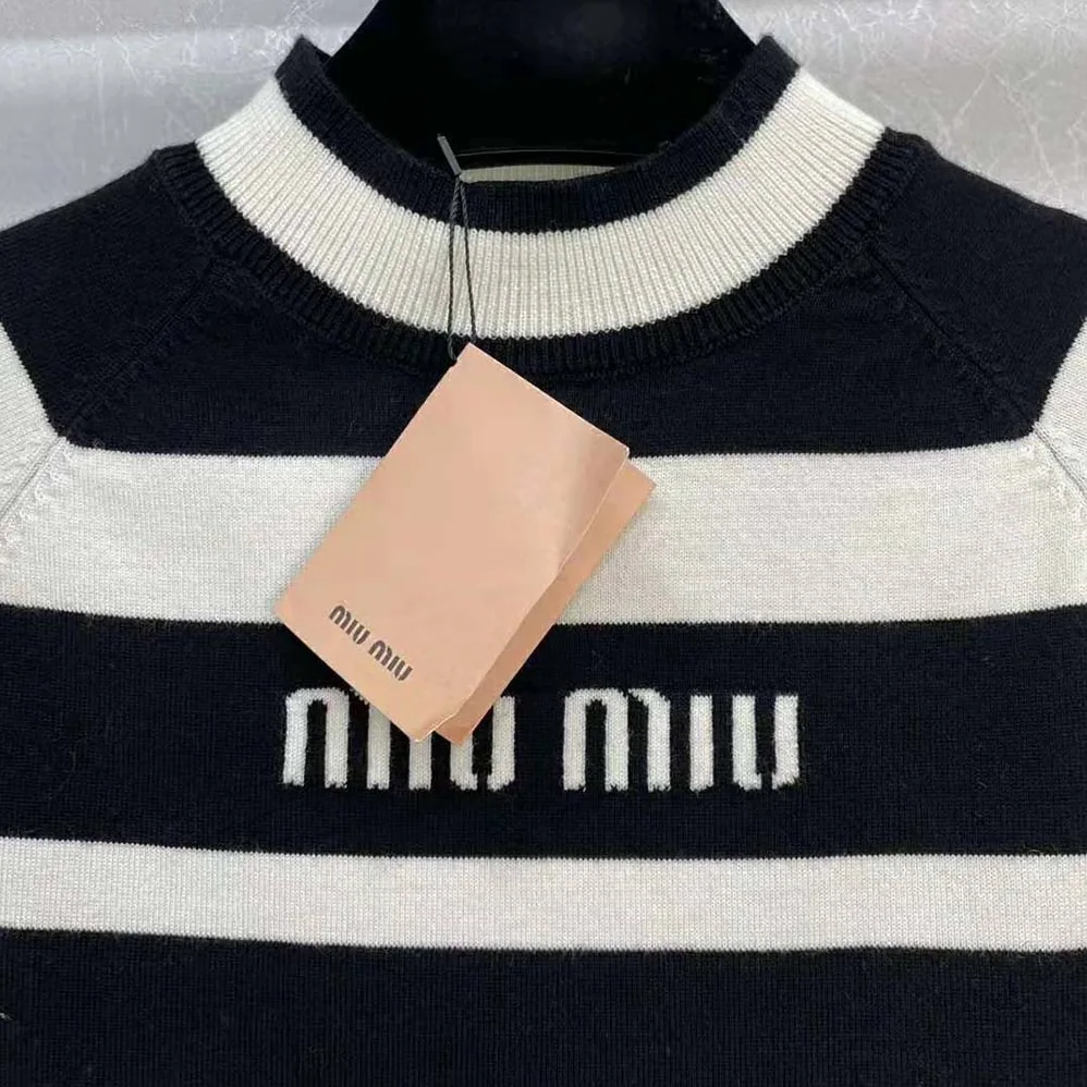Miu Miu Cashmere and Silk Turtleneck Sweater for Women