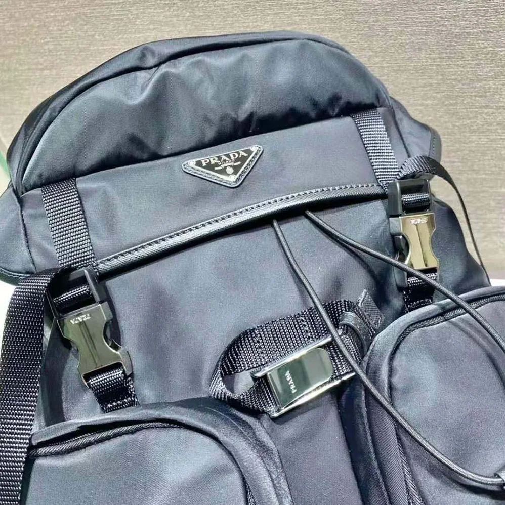 Prada Re-Nylon and Saffiano Leather Backpack with Triangle Logo for Unisex in Black