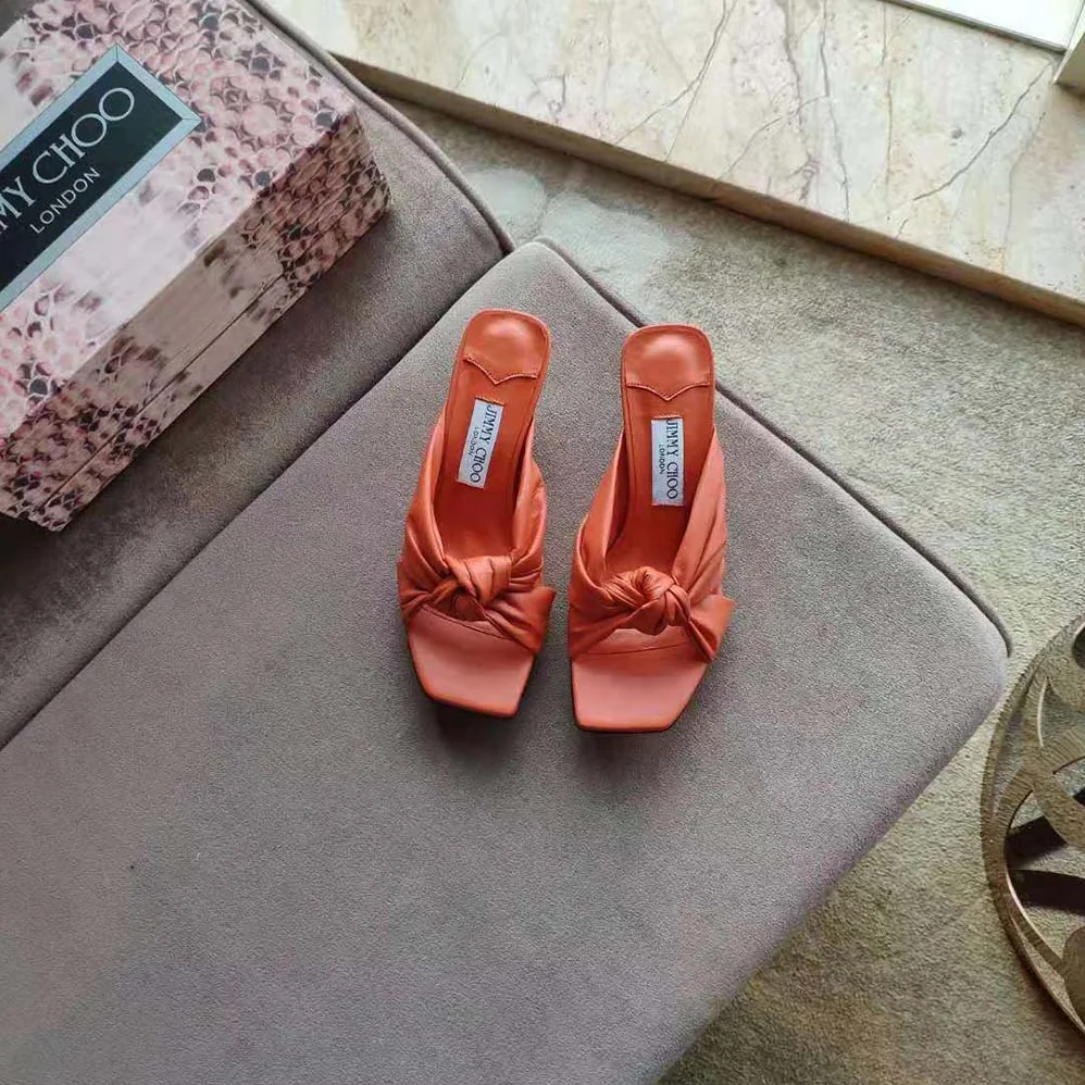 Jimmy Choo Avenue 50 Latte Nappa Leather Mules for Women in Orange Jimmy Choo Avenue 50 Latte Nappa Leather Mules for Women in Orange