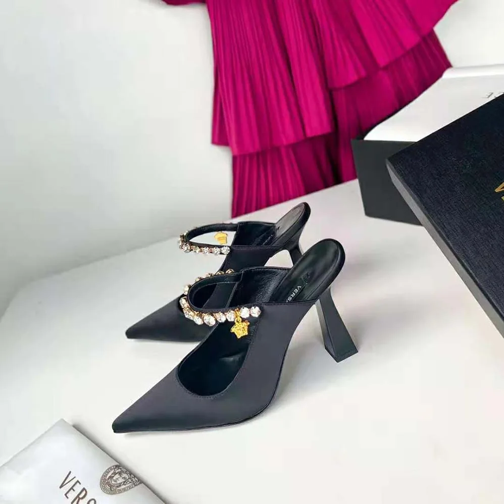 Versace Artifact Mules in 105mm Heel Height for Women in Black Versace Artifact Mules in 105mm Heel Height for Women in Black
