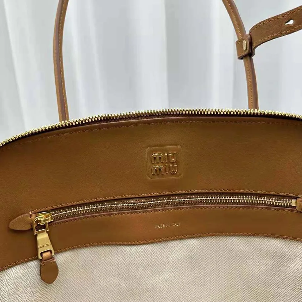 Miu Miu Leather Bag with Embossed Lettering Logo for Women in Brown Miu Miu Leather Bag with Embossed Lettering Logo for Women in Brown