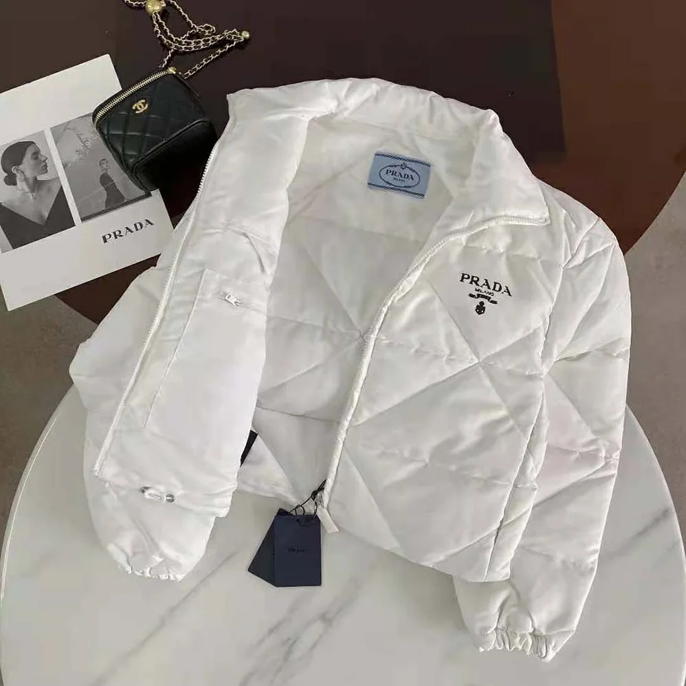 Prada Re-Nylon Gabardine Cropped Down Jacket for Women in White Prada Re-Nylon Gabardine Cropped Down Jacket for Women in White