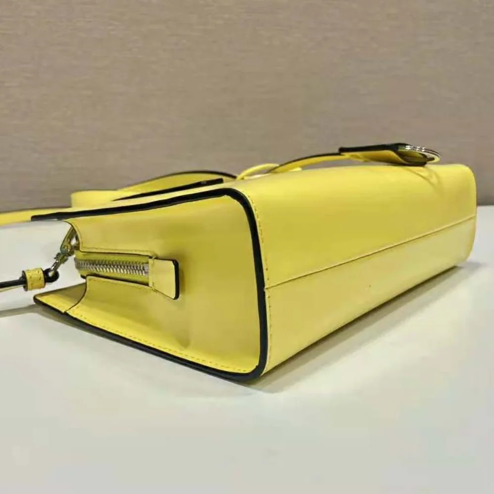 Prada Re-Edition 1995 Brushed-Leather Mini Handbag for Women in Yellow Prada Re-Edition 1995 Brushed-Leather Mini Handbag for Women in Yellow