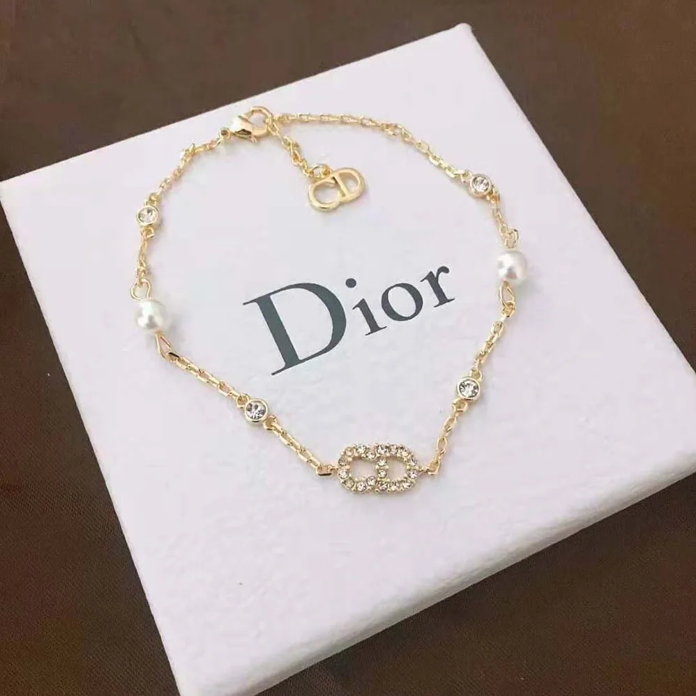 Dior Clair D Lune Bracelet Gold-Finish Metal with White Resin Pearls and White Crystals for Women Dior Clair D Lune Bracelet Gold-Finish Metal with White Resin Pearls and White Crystals for Women