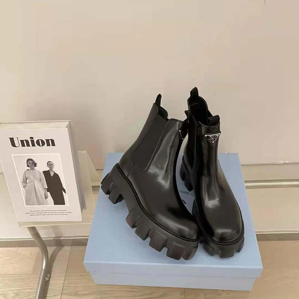 Prada Monolith Brushed Leather Booties for Women in Black