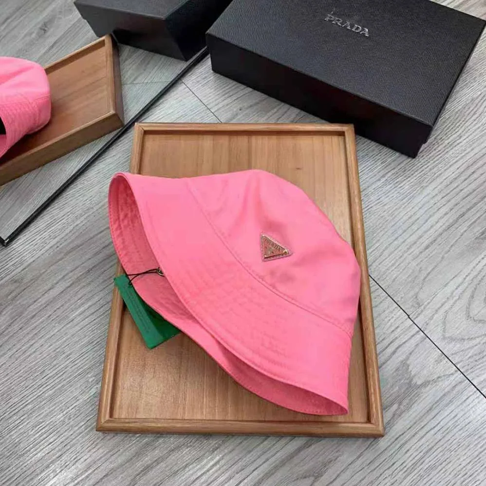 Prada Nylon Bucket Hat Decorated with the Triangle Logo for Women in Pink Prada Nylon Bucket Hat Decorated with the Triangle Logo for Women in Pink