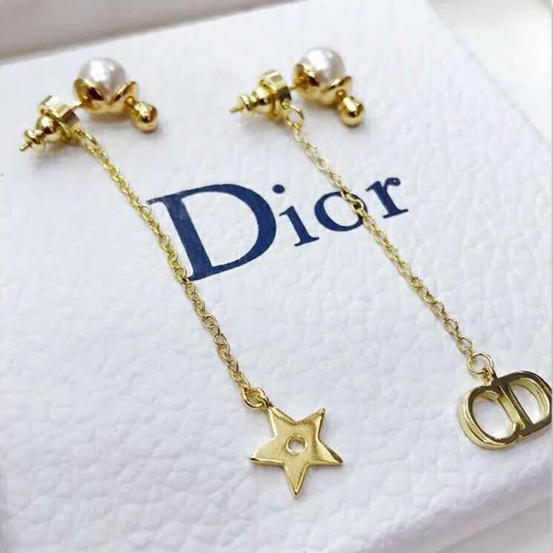 Dior La Petite Tribale Earrings in Gold for Women in Tone Metal Dior La Petite Tribale Earrings in Gold for Women in Tone Metal