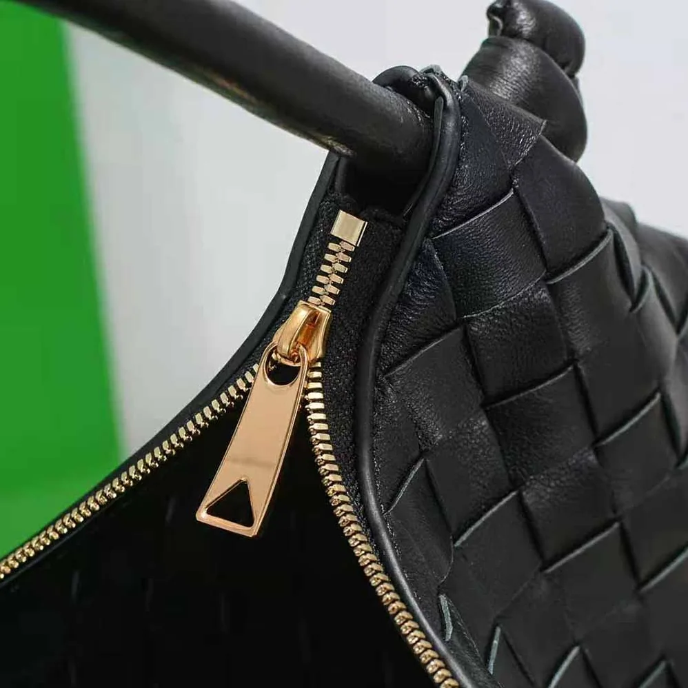 Bottega Veneta Turn Medium Intrecciato Leather Pouch with Adjustable Strap for Women in Black