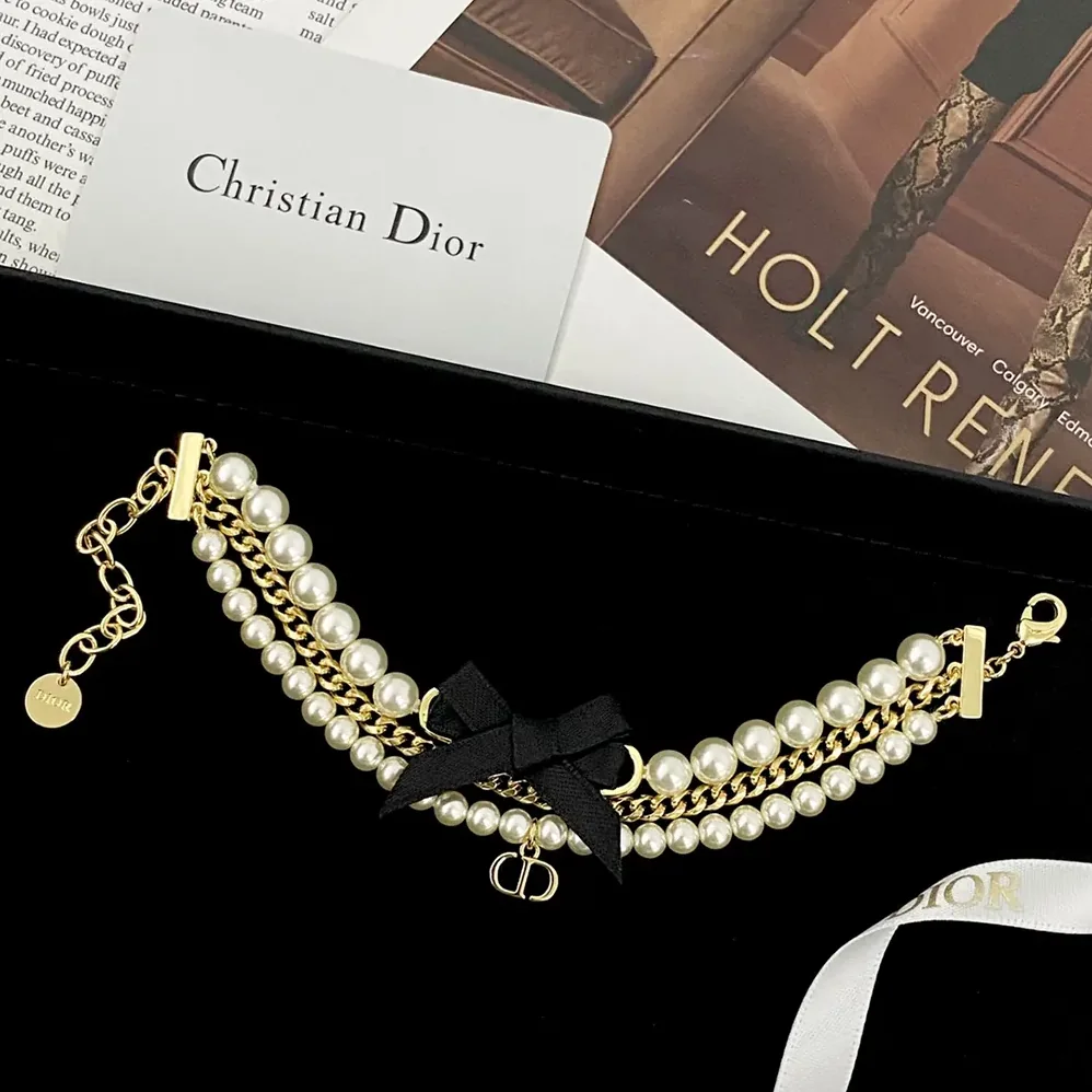 Dior Le Nœud de Dior Bracelet Gold-Finish Metal with White Resin Pearls and Black Satin for Women Dior Le Nœud de Dior Bracelet Gold-Finish Metal with White Resin Pearls and Black Satin for Women