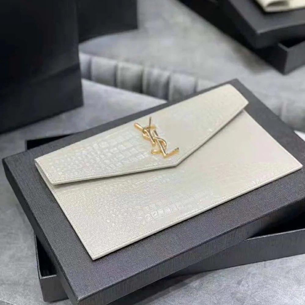 Saint Laurent YSL Uptown Pouch in Crocodile Embossed Shiny Leather for Women in Gold Saint Laurent YSL Uptown Pouch in Crocodile Embossed Shiny Leather for Women in Gold